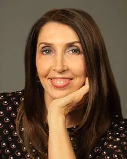 Headshot photo of Madeleine Dobie