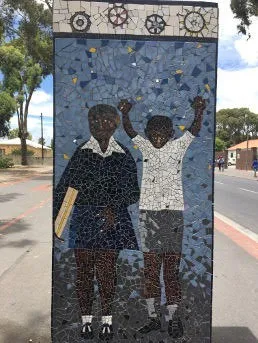 Mosaic plinth in Langa township commemorating August 1976 anti-apartheid student uprisings, particularly honoring Xolile Mosi, a 17-year-old who was shot and killed by police.